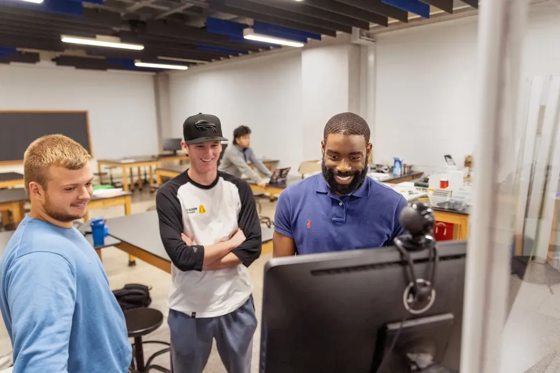 Engineering students working on a project.